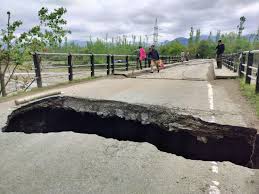 Flood damaged the main bridge in Kulgam village
